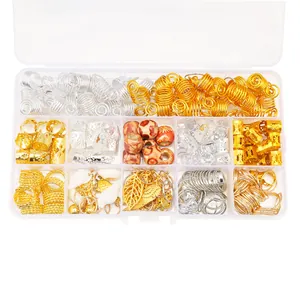 Macro shot of assorted gold and silver hair charms with shells and beads in a plastic box