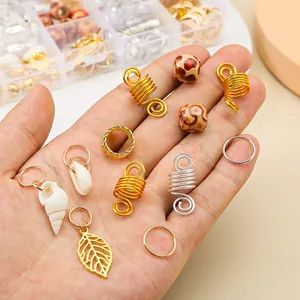 Mix of gold and silver spring hair coils with shells and beads for dreadlocks hair styling