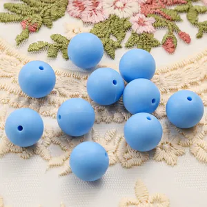 Close-up of 15mm light blue silicone beads for DIY jewelry and bracelet making