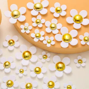 Mix of white resin flower charms with gold centers for DIY shoe and accessory decor