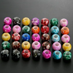 Detailed view of 12mm colorful acrylic beads with marble texture and large holes for DIY jewelry
