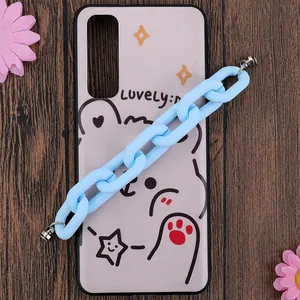 Detail of light blue matte acrylic chain attached to a pink cartoon bear phone case