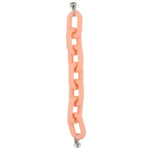 Detail of peach pink matte acrylic phone chain with silver metal ring connectors
