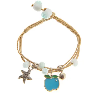 Bohemian ceramic beaded bracelet with starfish apple charm and soft beige woven cord