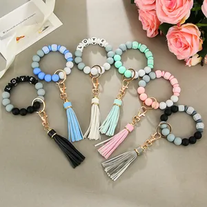 PU-Leder Quaste Perlen-Schlüsselanhänger Armband mit LOVE-Buchstaben in Morandi-Farben