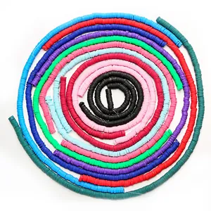 Vibrant 6mm rainbow heishi beads spiral arrangement for handmade DIY jewelry making