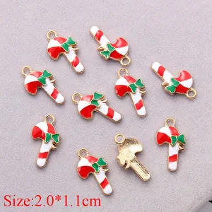 Detailed view of candy cane Christmas charms with measurements for DIY jewelry making