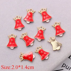 Detailed view of red Christmas bell charms with golden antlers for DIY jewelry making