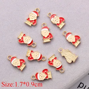 Front and back detail of Santa Claus enamel alloy charms with size 1.7x0.9cm for DIY jewelry