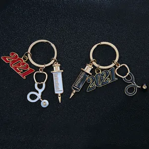 2021 medical keychain with stethoscope and syringe charms in red and black