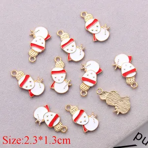 Detailed macro view of 2.3x1.3cm snowman alloy charms with festive red and white enamel