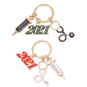 Nurse series 2021 syringe and stethoscope gold alloy keychains in black and red enamel
