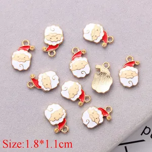 Detail view of 1.8x1.1cm Santa Claus enamel charms with rhinestone for DIY jewelry