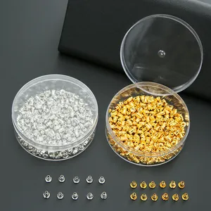 Cierres de pendientes chapados en oro de 14K y plata en dos cajas transparentes de kit