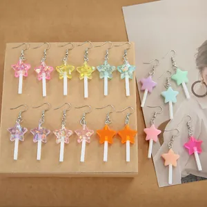 Boucles d'oreilles sucettes étoiles colorées en résine pastel avec crochets