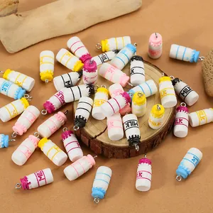 Colorful resin milk bottle charms for DIY earrings with metal hooks on wood