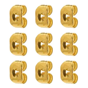 Detailed view of nine gold-plated butterfly earring backs in an organized grid