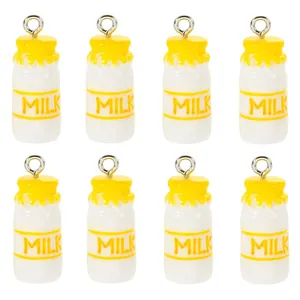 Detailed macro view of eight mini 3D resin milk bottle charms with silver metal loops