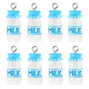Close-up of eight cute resin milk bottle charms with blue accents and silver metal rings