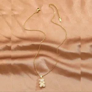 Elegant gold plated necklace featuring a teddy bear pendant fully pavé-set with zircons
