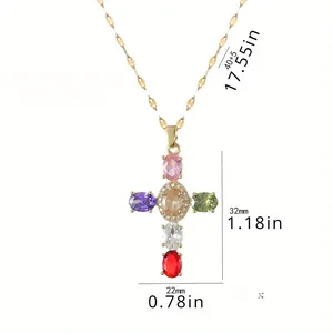 Golden cross necklace with colorful oval gemstones and zirconia pavé detail