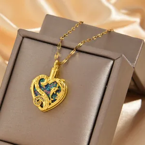 Golden heart urn necklace with dolphin design and always in my heart engraving