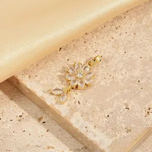 Elegant gold flower pendant necklace with white zircon petals and leaf charms