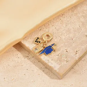 Golden heart, passport and cruise ship pendant necklace with zircon on a stone plate