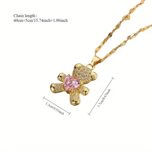 Gold double-layer necklace with hollow bear pendant and pink heart zircon gemstone