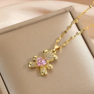 Golden teddy bear necklace with pink heart crystal and sparkling zircon pavé detail