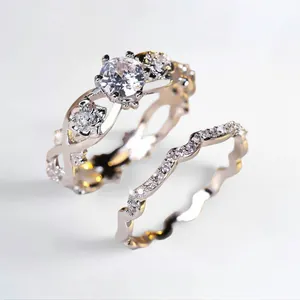 Elegant silver rose flower ring set with cubic zirconia stones and wavy band