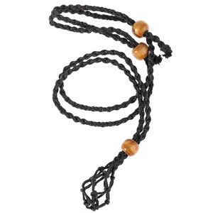 Handmade black woven mesh net stone holder necklace with wooden beads on white background