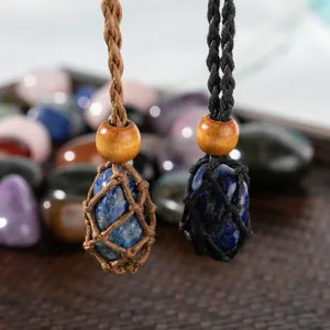 Detail of hand-woven net pouches holding lapis lazuli gemstones with wooden beads