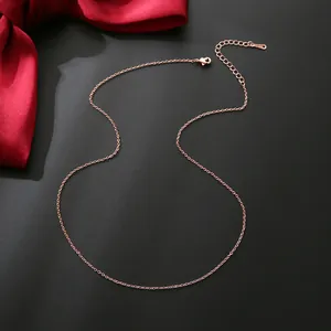 Rose gold 14k plated necklace chain with lobster clasp on elegant dark background