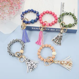 Buntes Perlenarmband-Schlüsselanhänger-Set mit Leopardenmuster und Lederquasten