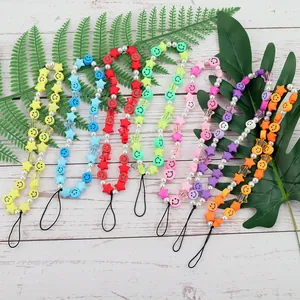 Colorful beaded phone charms with smiley faces and star beads in macaron pastel shades