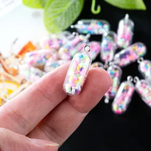 Creative pill capsule charms with colorful filling and metal ring for DIY jewelry making