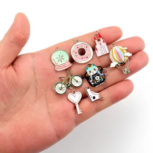 DIY colorful enamel charms set featuring cartoon hot air balloons and cute cats for jewelry