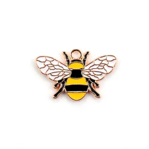 Detailed view of a yellow enamel honey bee charm with gold plating for DIY jewelry making
