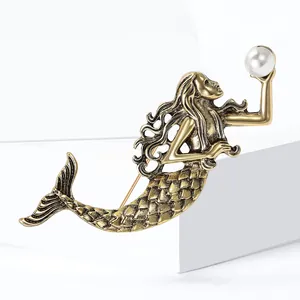 Vintage mermaid brooch in antique gold finish with white pearl accent for women