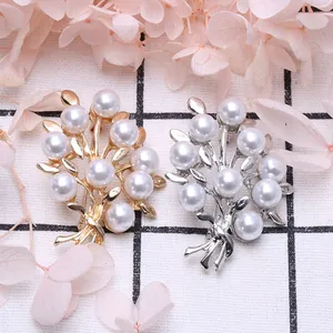 Elegant floral pearl brooches in gold and silver finish with leaf details for women