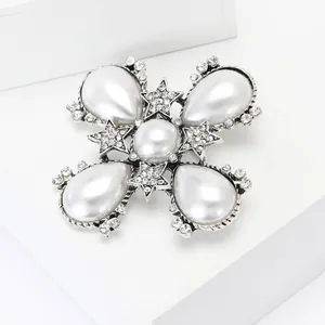 Baroque pearl brooch with silver crystal star and cross design for women's apparel