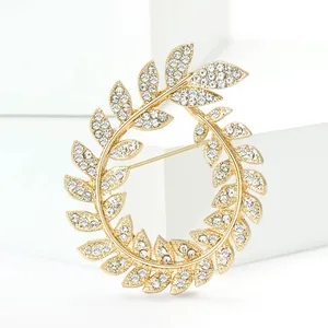 Elegant gold olive branch wreath brooch with sparkling rhinestones for suits
