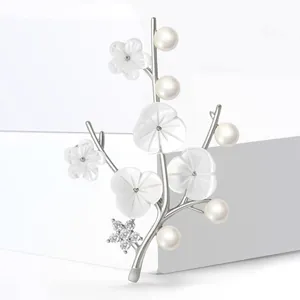 Elegant silver plum blossom brooch with white freshwater pearls and cubic zirconia