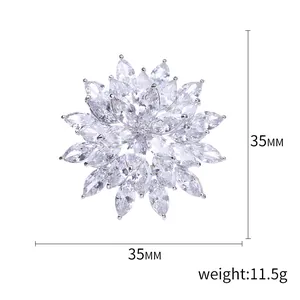 Elegant snowflake brooch with cubic zirconia stones in silver finish, 35mm x 35mm size