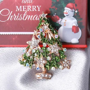 Sparkling Christmas tree brooch with green enamel and white rhinestones on gold base