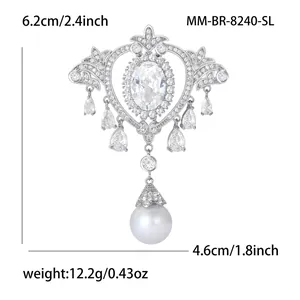 Luxury Baroque palace style silver brooch with crystals, tassels, and a large round pearl