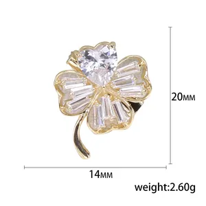 Elegant gold four-leaf clover brooch with zircons, measuring 20mm by 14mm and 2.60g