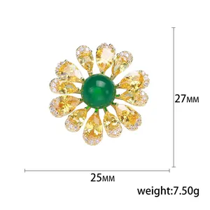 Elegant emerald green gemstone and yellow zircon sunflower brooch in gold plating