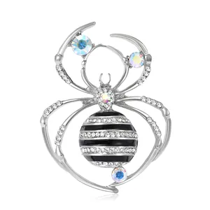 Spider brooch pin with silver metal, sparkling crystals and colorful AB gemstones